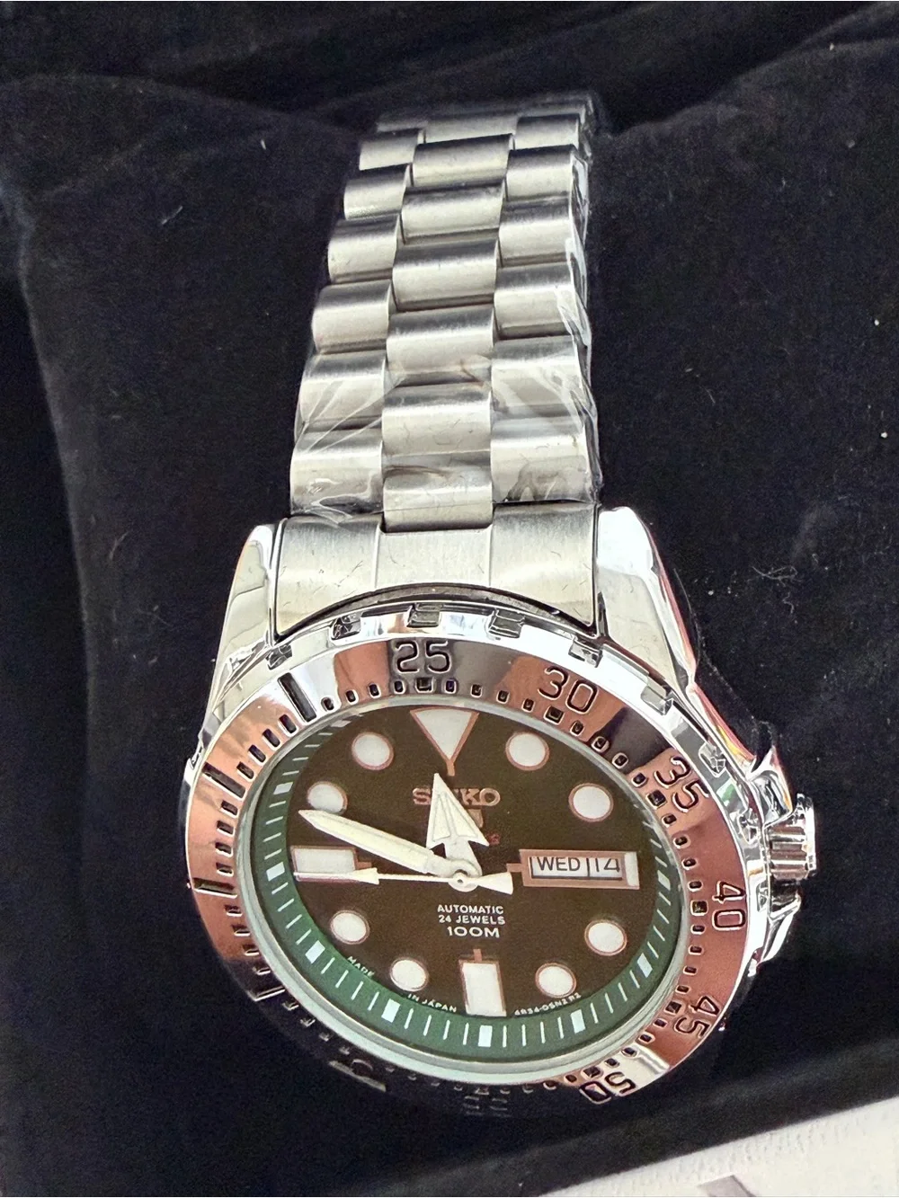 Seiko Stainless Steel Watch with Green Dial and Silver Bezel